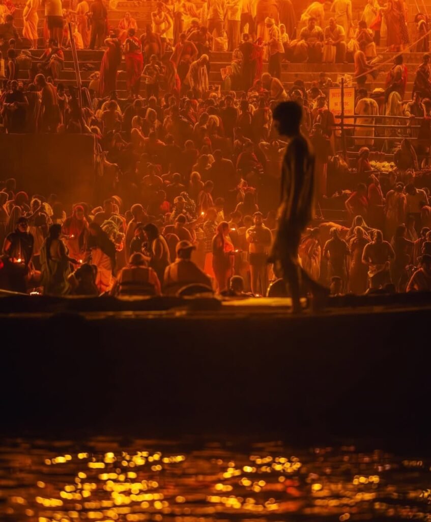 Dev Deepawali boat booking in Varanasi 2026 showing Ganga Aarti and diya-lit ghats from boat